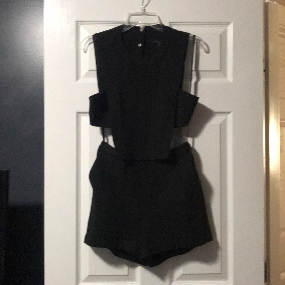 Black BCBG Cut out Romper with Tags!